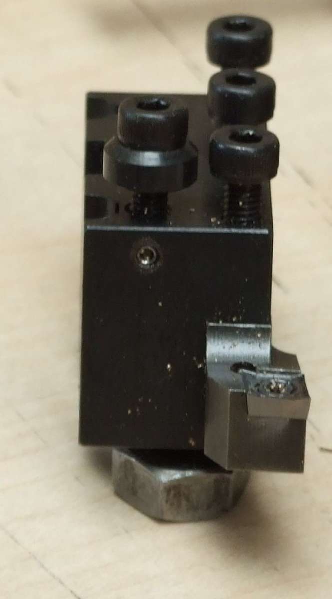 Showing Adj Clamp Screw.
