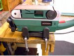 The belt sander as supplied, mounted on the bench